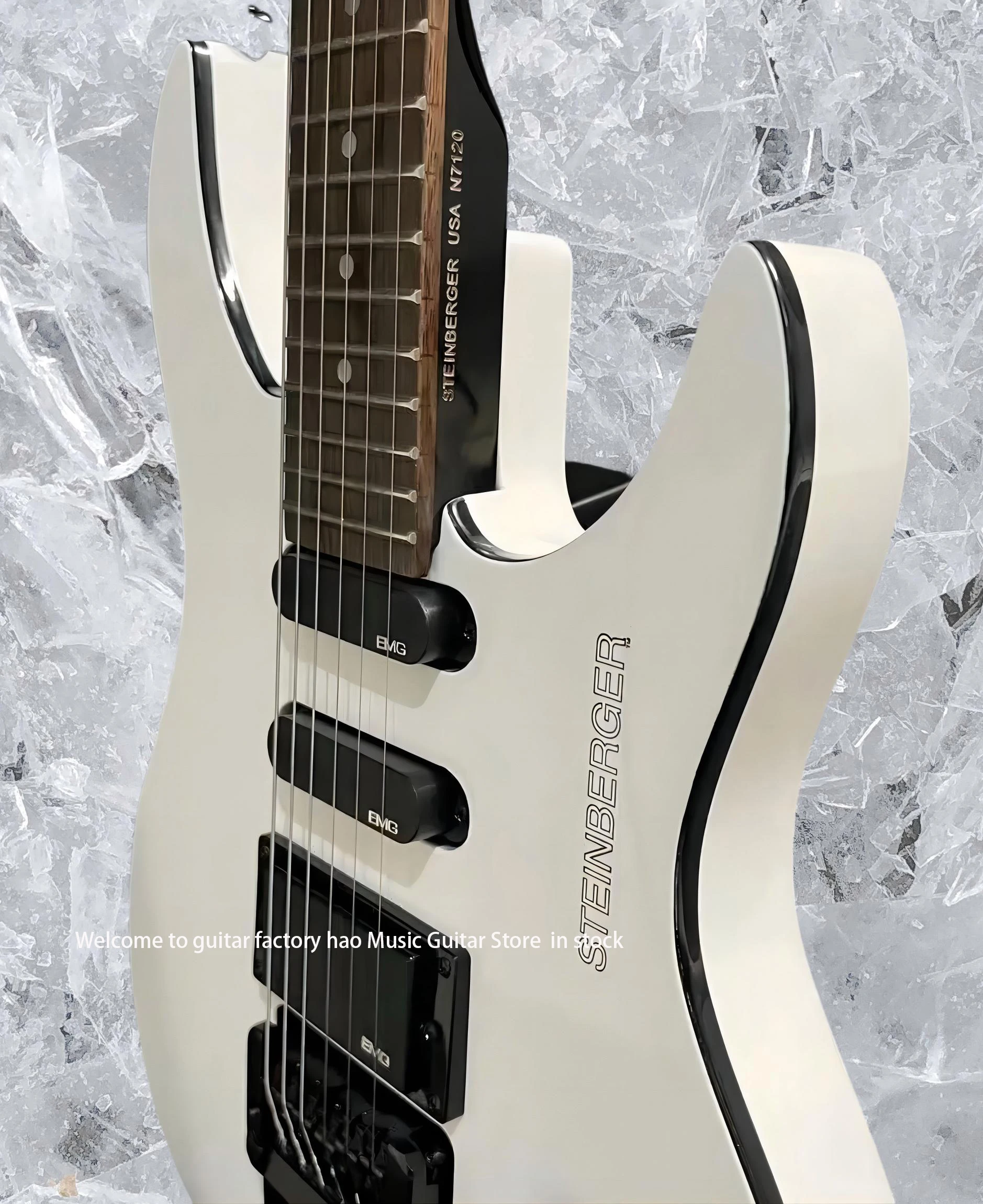 جيتار كهربائي بدون رأس، جسم الماهوجني، جسر فلويد روز تريمولو، جيتار مكون من 6 أوتار، إصدار شتاينبرغ