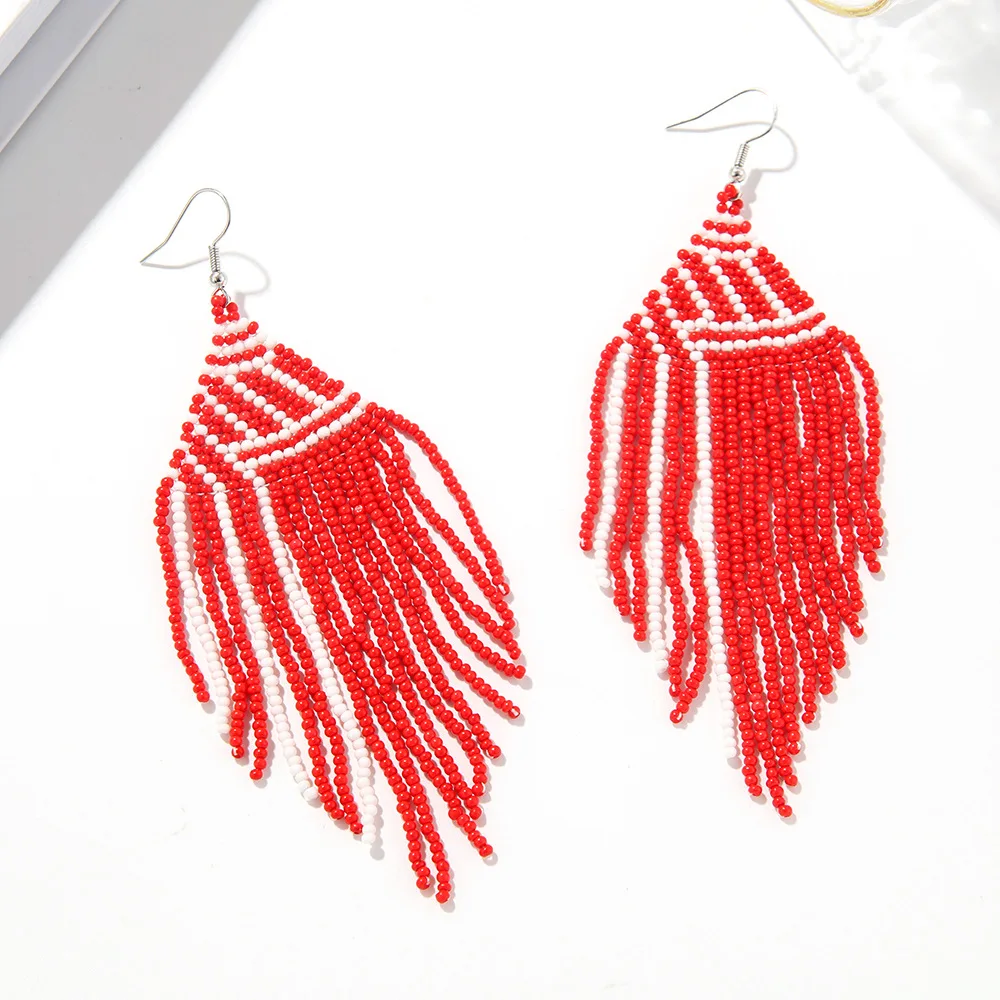 

Серьги из рисовых бусин в богемном стиле, женские серьги из сплава с кисточками, геометрические, соответствующие цвету, универсальные, индивидуальные, простые серьги из бисера