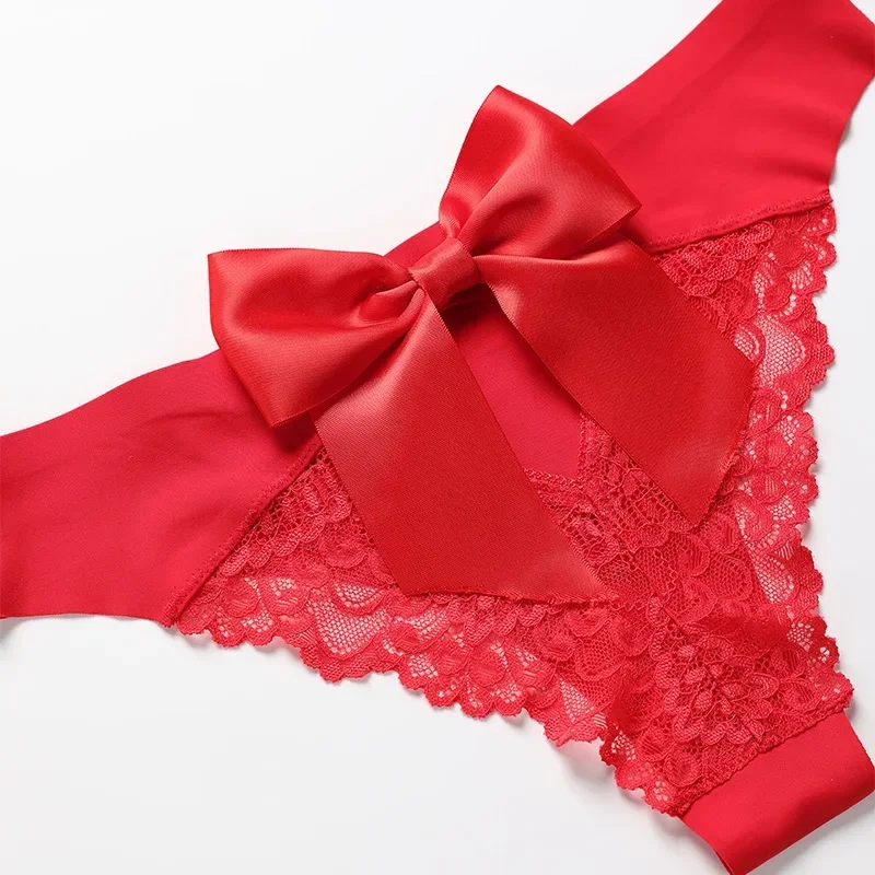 Bragas sexis de encaje de cintura baja, tangas con lazo calado, Tanga transpirable de seda helada, regalo de Navidad rojo, lencería femenina, bragas para mujer