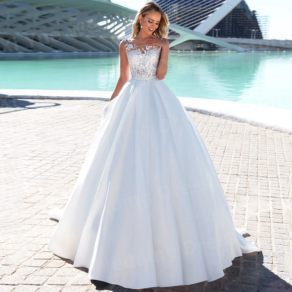 

Graceful A Line Women's Wedding Dresses O Neck Bride Gowns Lace Appliques Vestidos Sleeveless Satin Customized Robe De Mariée