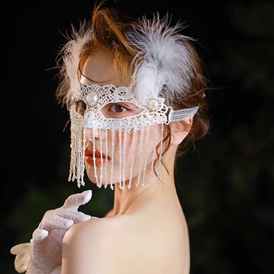 

Elegant Masquerade Mask With White Feather and Pearl Accents