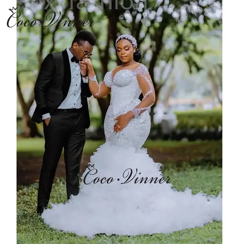 Anpassad Afrikansk Lyxig Sjöjungfru Bröllopsklänning För Kvinnor 2025 Ny Långärmad Med Tunga Pärlor Paljetter Spets Brudklänning W1381 10 best sales importerade bröllopsklänningar - №2