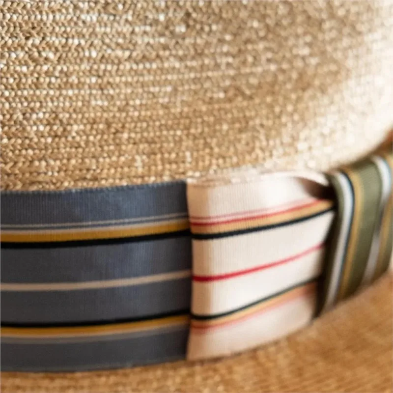New fashionable hat with webbing knot decoration top