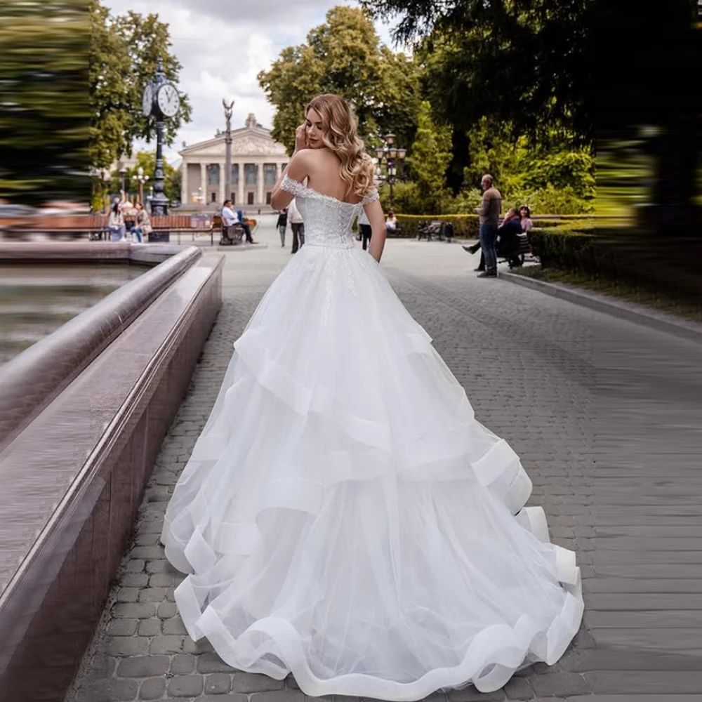 2025 Al largo della spalla A-Line Abiti da sposa da donna Moderni applicazioni di pizzo Abiti da sposa Ball Princess Vestido Novia Boda Personalizzato