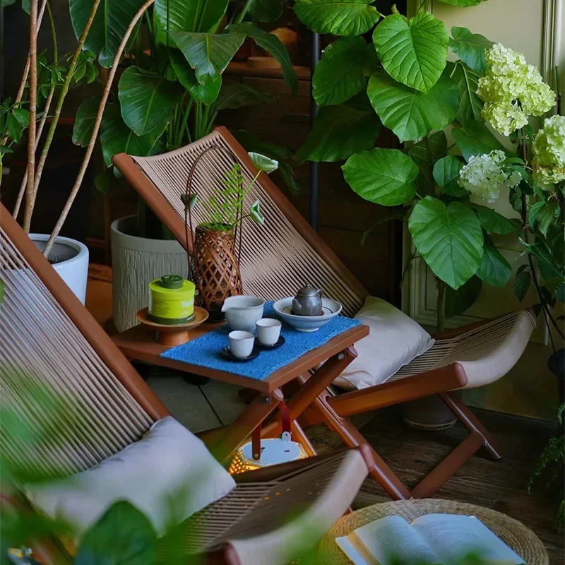 

Outdoor tables and chairs, balcony three-piece household rattan chairs, dining table can be reclined for lunch