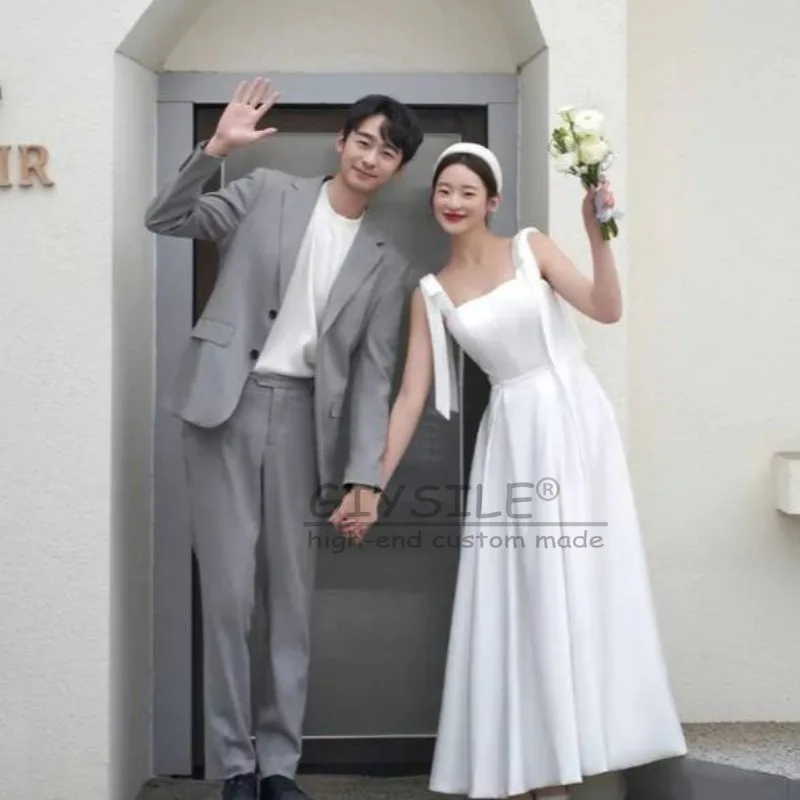 ชุดแต่งงานแบบเรียบง่ายสไตล์สลิงแฟชั่นจาก GIYSILE รุ่นใหม่ปี 2026 ทรงเอไลน์ผ้าซาตินประดับโบว์ ชุดราตรีสำหรับผู้หญิง ดีไซน์หรูหรา