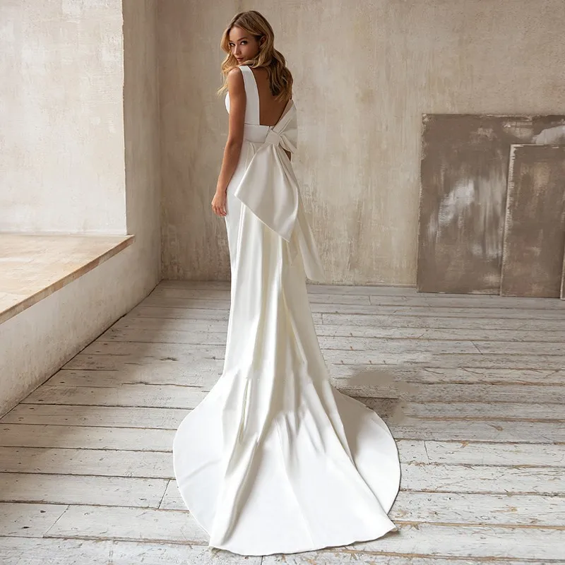 Eleganti abiti da sposa a sirena con fiocco in treno staccabile abito da sposa semplice Boho abito da sposa bianco avorio con scollo a v Vestidos De Novia