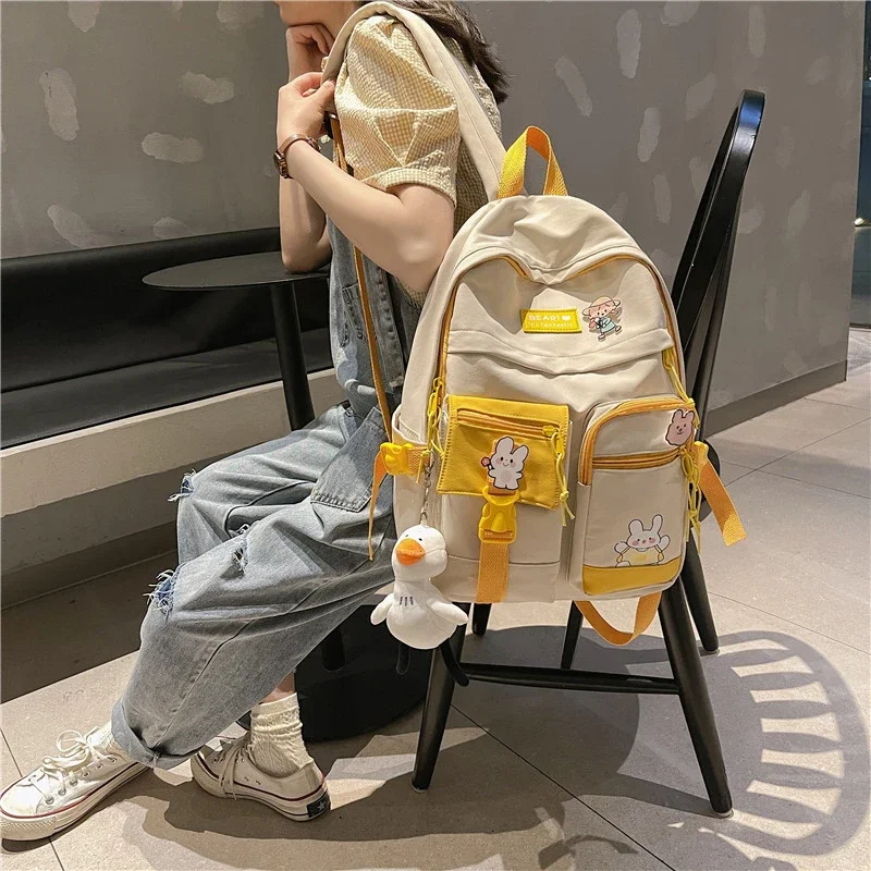 Fashion Large Badge Buckle Backpack Women Waterproof Canvas Backpacks TeenageGirl School Bag Fancy High Capacity StudentBook Bag