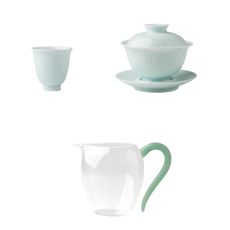 

Jingdezhen engraved shadow celadon cover bowl set is simple, ceramic cover bowl teacup set