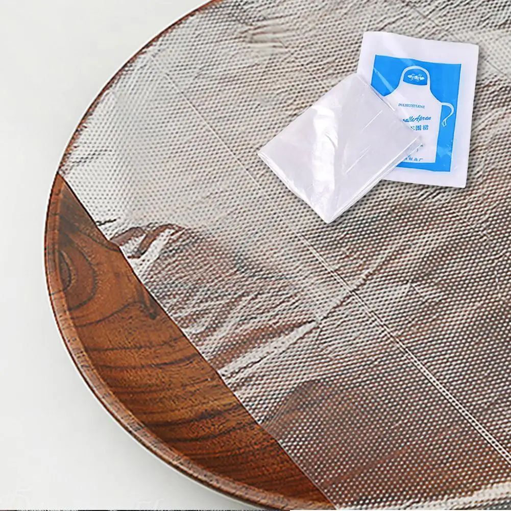 50 Stück Einweg-Küchenschürzen aus Kunststoff, wasserdichte Schürze, einzeln verpackte Kleider für Männer und Frauen, Küchenschutz-Zubehör