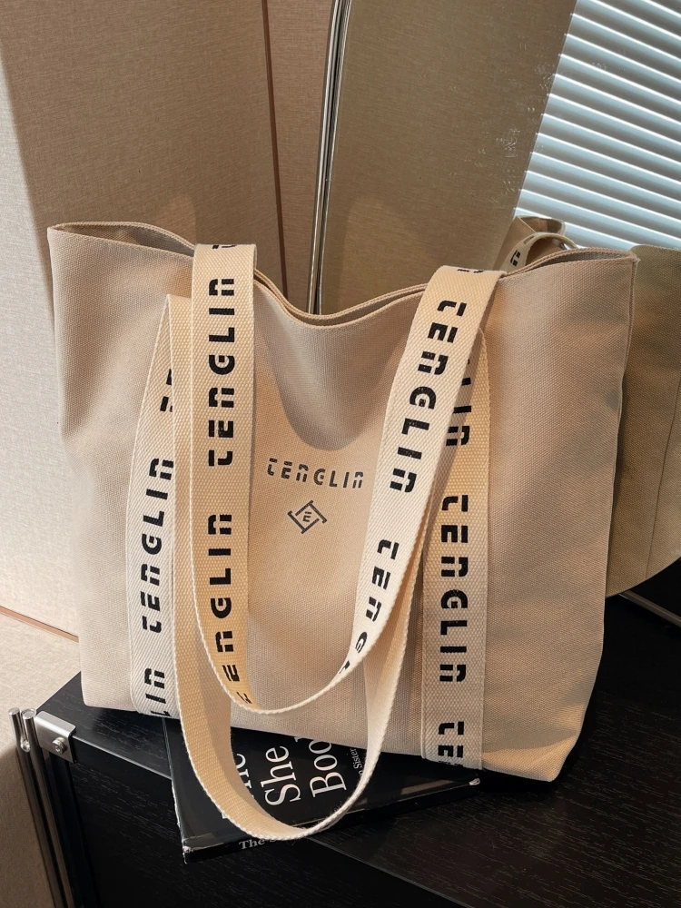 

Large Capaci Canvas Tote Bag Women's 2026 New Faion College Student Class Bag Versatile Simple oulder Bag Commuter Bag