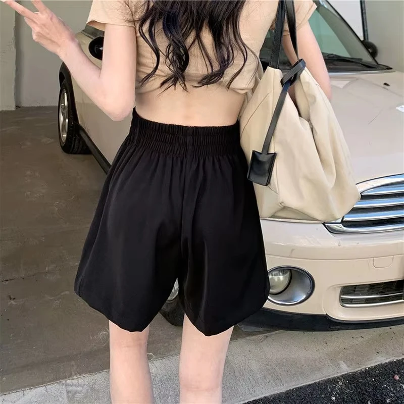 شورت نسائي أسود للفصول الأربعة كاجوال فضفاض مرن عالي الخصر شورت رياضي نسائي برباط واسع الساق