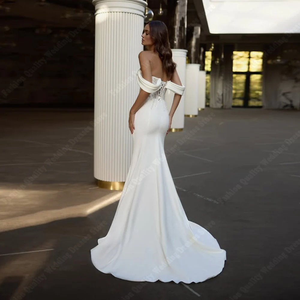 ชุดแต่งงานผู้หญิงแบบคอหวาน แขนกุด เซ็กซี่ เปิดไหล่ ทรงบอลล์ ยาวลากพื้น  แบบสั่งตัดได้