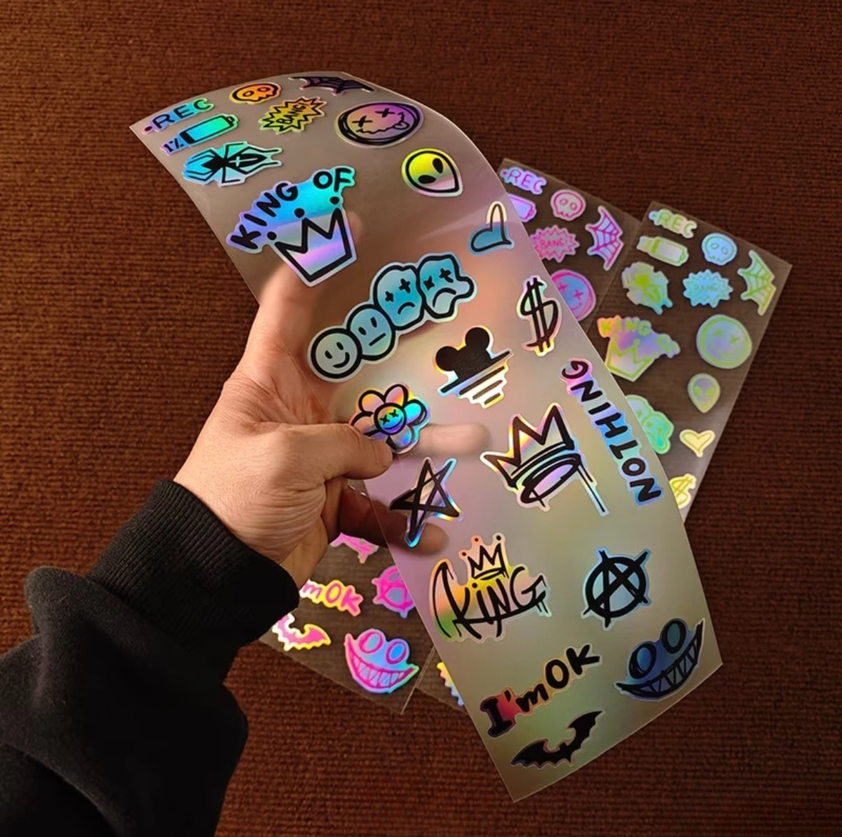 

Laser Graffiti Stickers Set Waterproof Vinyl Moto Decals with Crown Alien Smiley Design for Bike Car Laptop Phone DIY Decoration
