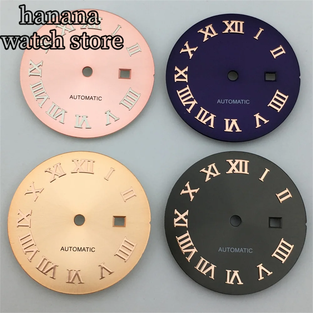 قرص NH05 للسيدات مقاس 24.5 ملم باللون الأسود والذهبي والوردي ومينا للتعرض اليومي باللون الأبيض اللامع مع مؤشر روماني يدوي مناسب لحركة NH05