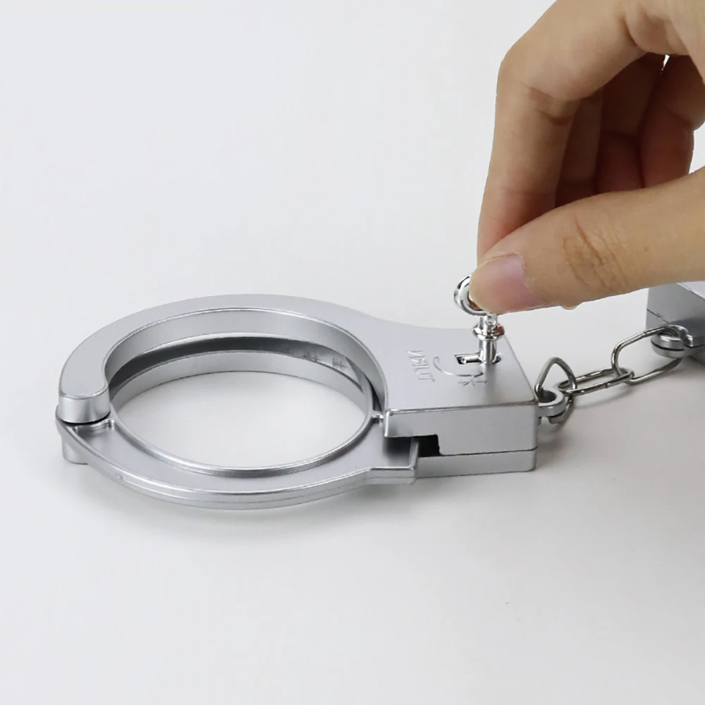 قطعة واحدة من الأصفاد البلاستيكية مجموعة لعب الأدوار تلعب ضباط الشرطة الصغيرة، نماذج أصفاد لعبة الأطفال