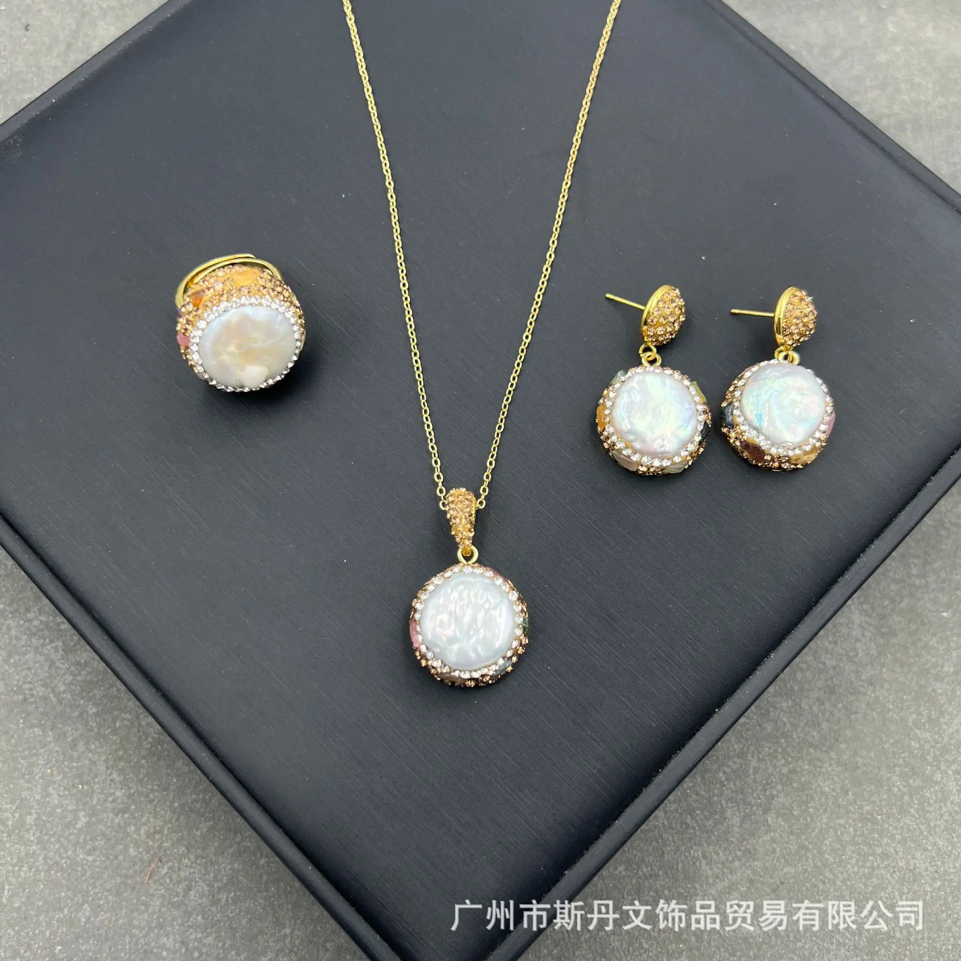 

New Baroque heterosexual pearl Czech crystal literary and retro unique personality, three-piece pendant earrings ring