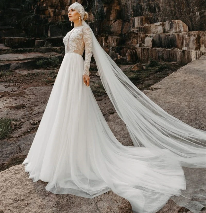 

Иллюзионные свадебные платья в стиле бохо с кружевными аппликациями и длинными рукавами из тюля цвета слоновой кости Свадебные платья Корсет Пляжное платье невесты Современное