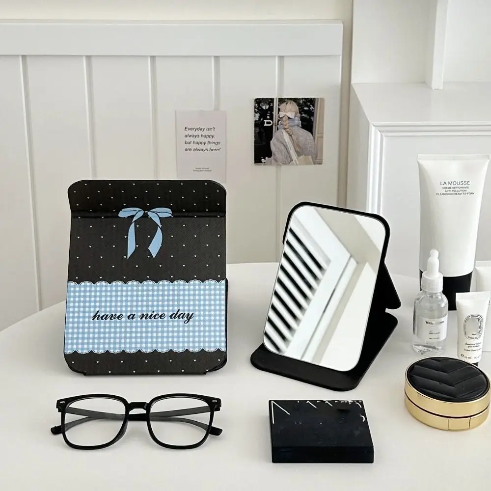 Espejo portátil de cuero Pu con soporte de escritorio, espejo de maquillaje plegable con lazo rosa, ligero, delicado espejo de maquillaje de bolsillo Unisex