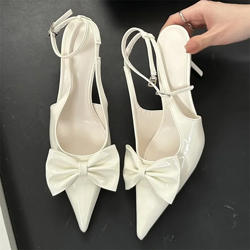 

Женские туфли-мюли Eilyken Spring Design на тонком низком каблуке, с острым носком, бантом-бабочкой и ремешком на пряжке, с открытыой пяткой