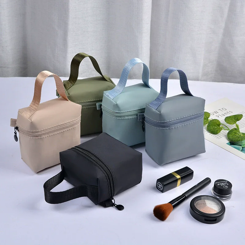 Top Selling High-end Portable Waterproof Handle Makeup Bag Lipstick Storage Bag Headphone Pouch Mini Menstrual Towel Bag