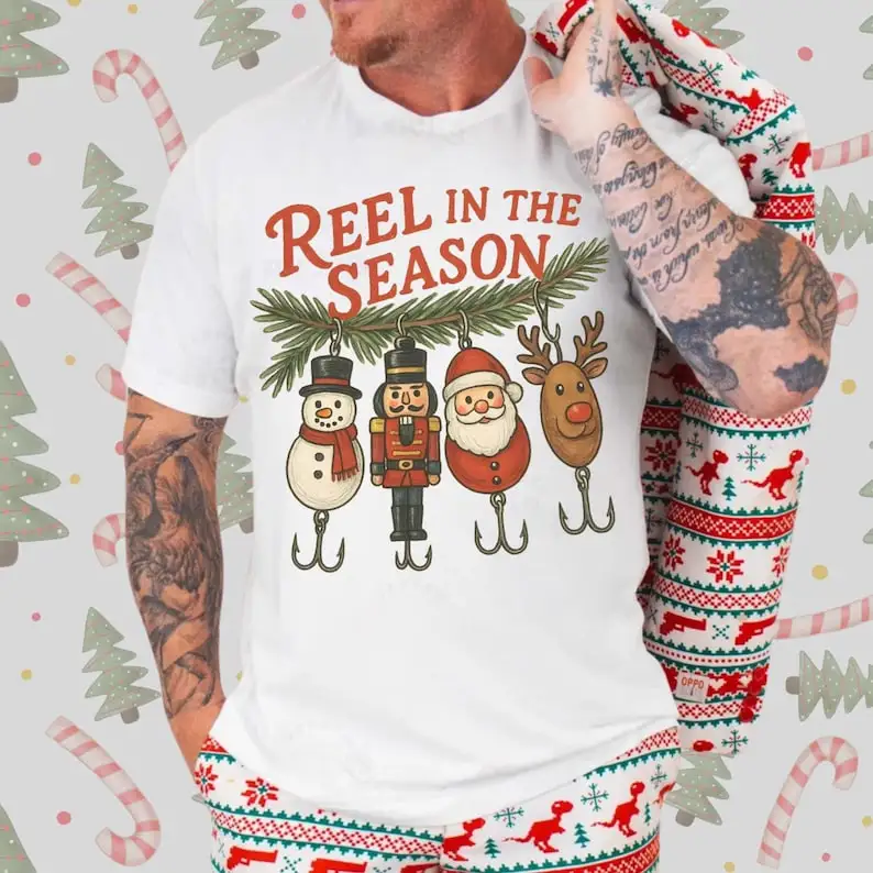 REEL IN THE SEASON Camisa de pesca navideña divertido pescador sublimado mujeres hombres algodón Tww Tops Y2k Top camisetas gráficas