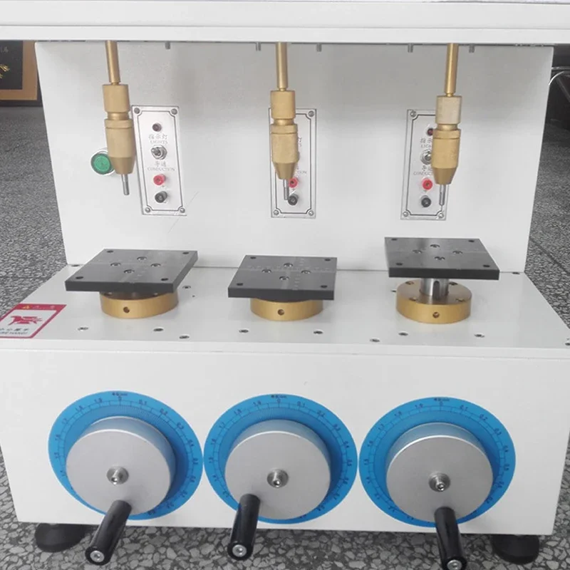 

Three-station button life testing machine