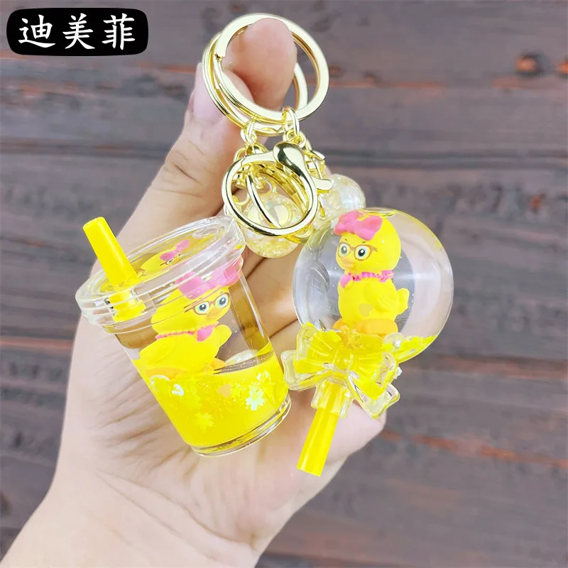 Creative Milk Tea Cup Keychain Cute Liquid Quicksand Floating Doll Small Pendant Schoolbag Accessories Wholesale