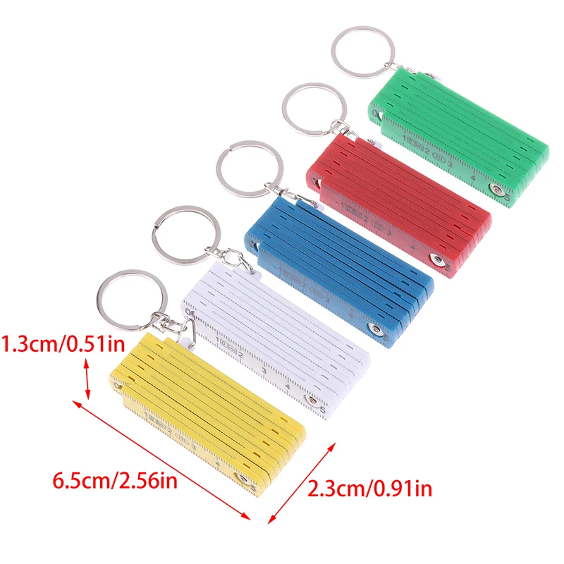 1ชิ้น0.5เมตร10พับพวงกุญแจพลาสติกความแม่นยำสูงไม้บรรทัดพับเก็บได้สำหรับการเดินทางงานไม้อิฐบ้าน DIY