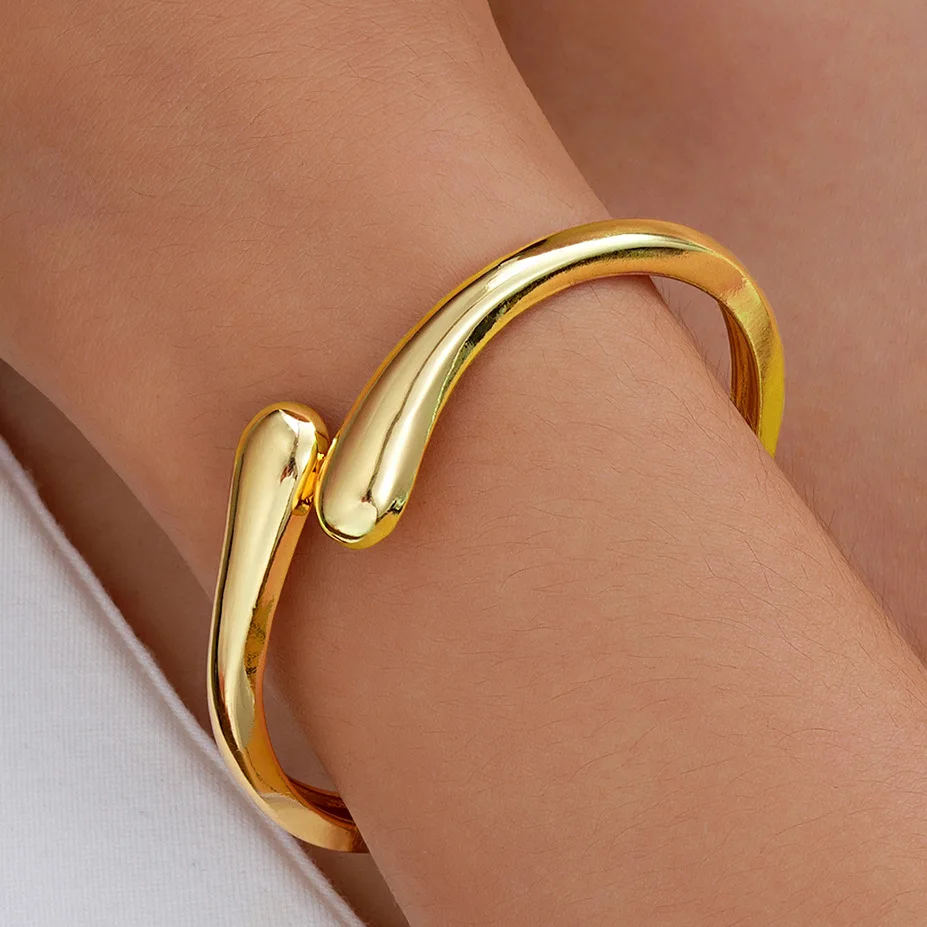 Fashion trend water drop streamline exaggerated bracelet metal texture smooth hug spring open bracelet