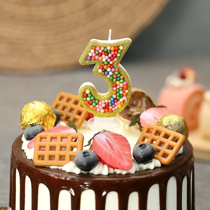 Birthday cake, party candles, decorative accessories, digital creativity, golden brushstrokes, mixed color beads, candles