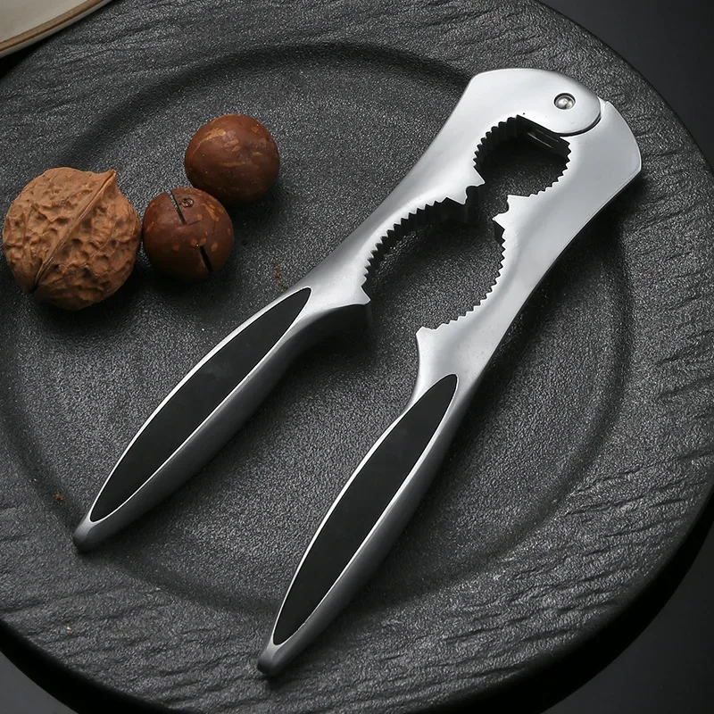 

Nut Crackers Nutcracker, Sheller Walnut Opener Plier with Good Grips for Walnuts Pecan Nut Hazelnuts Almonds Brazil Nuts