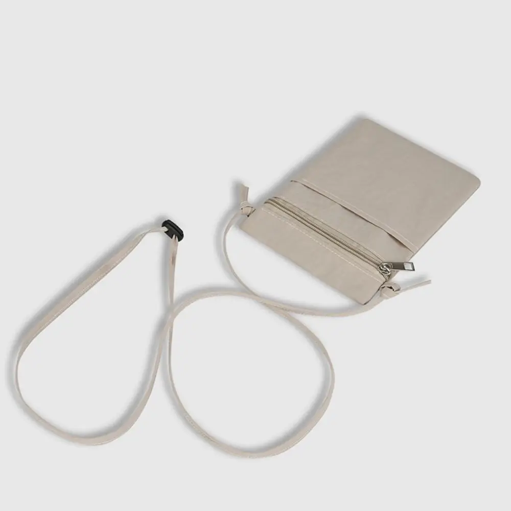 Minimalist Portable Cell Phone Bag Nylon Fabric Solid Color Shoulder Bag Lightweight Thin Strap Crossbody Bag for Men and Women