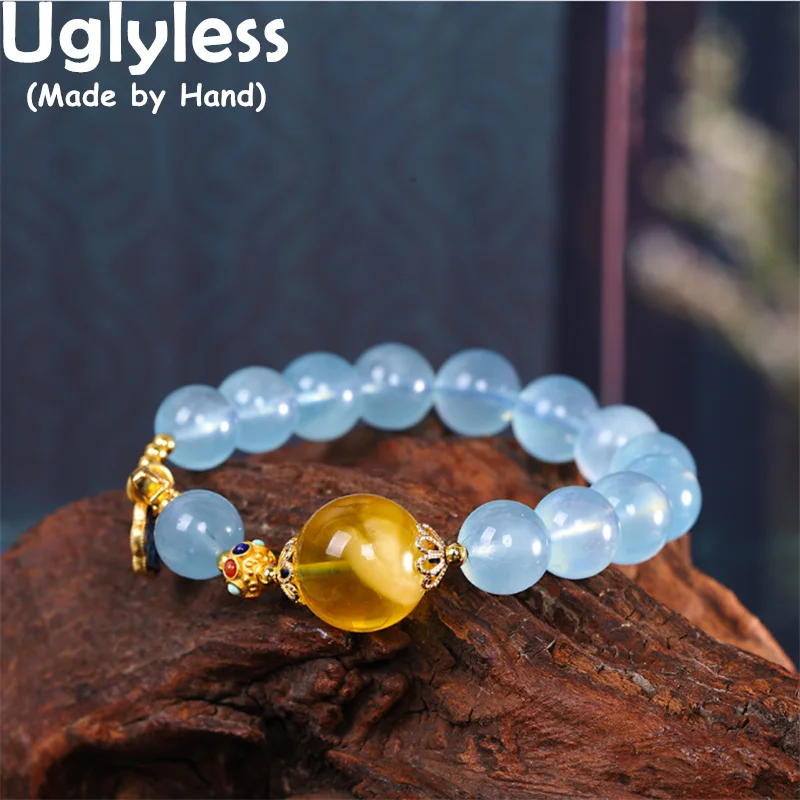 

Uglyless Adjustable Elastic Rope Natural Aquamarine Bracelets for Women 100% Real Amber Bracelets 925 Silver RUYI Ethnic Jewelry