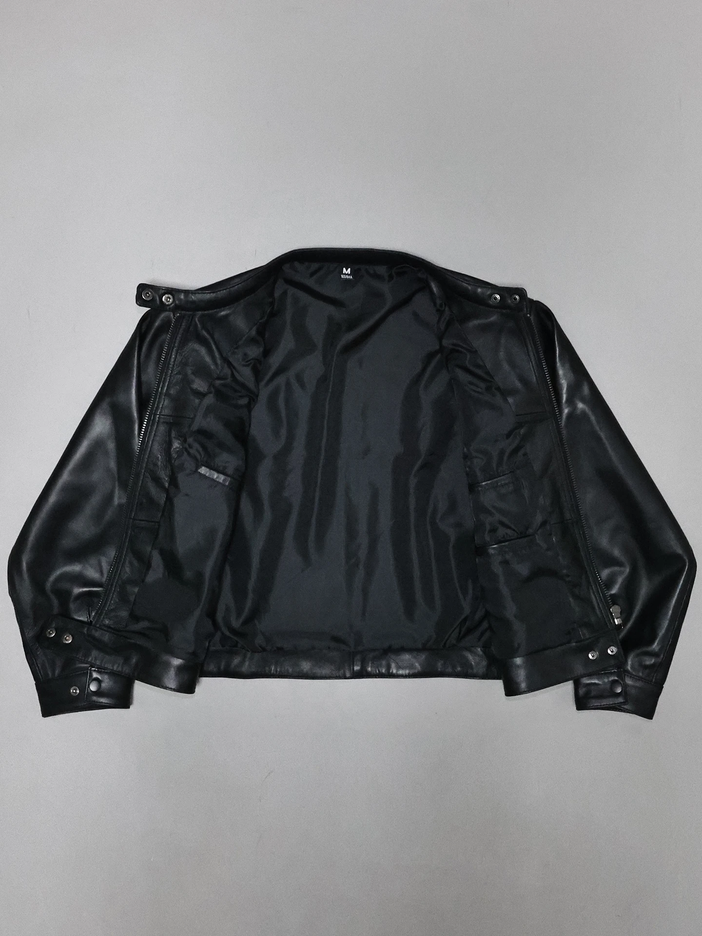 女性用第一層羊革ジャケット、ルーズショートスタンドカラーワークウェア、モーターサイクルバイカー用本革ジャケット、アウターウェア