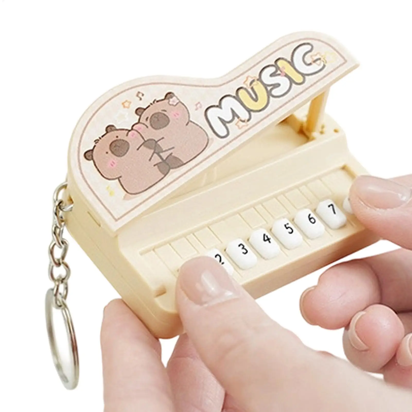 

Портативный мини-пианино-брелок, электронная клавиатура, игрушка-инструмент, может воспроизводить музыку, брелок для ключей, подарок для любителей и друзей, украшение.