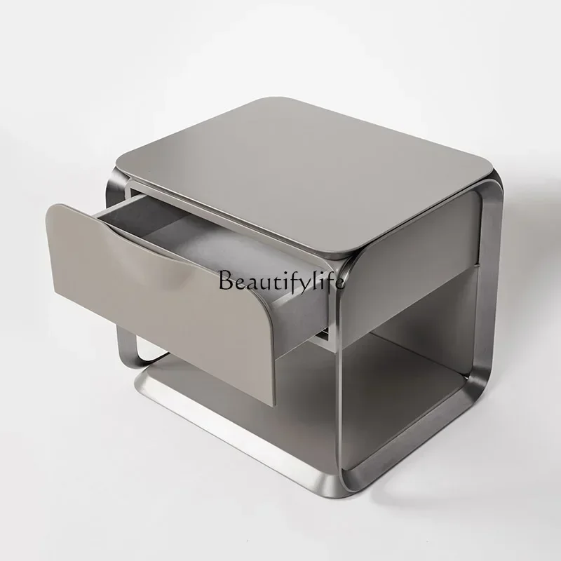 

Italian minimalist modern minimalist light luxury bedside table designer solid wood bedroom storage cabinetlx