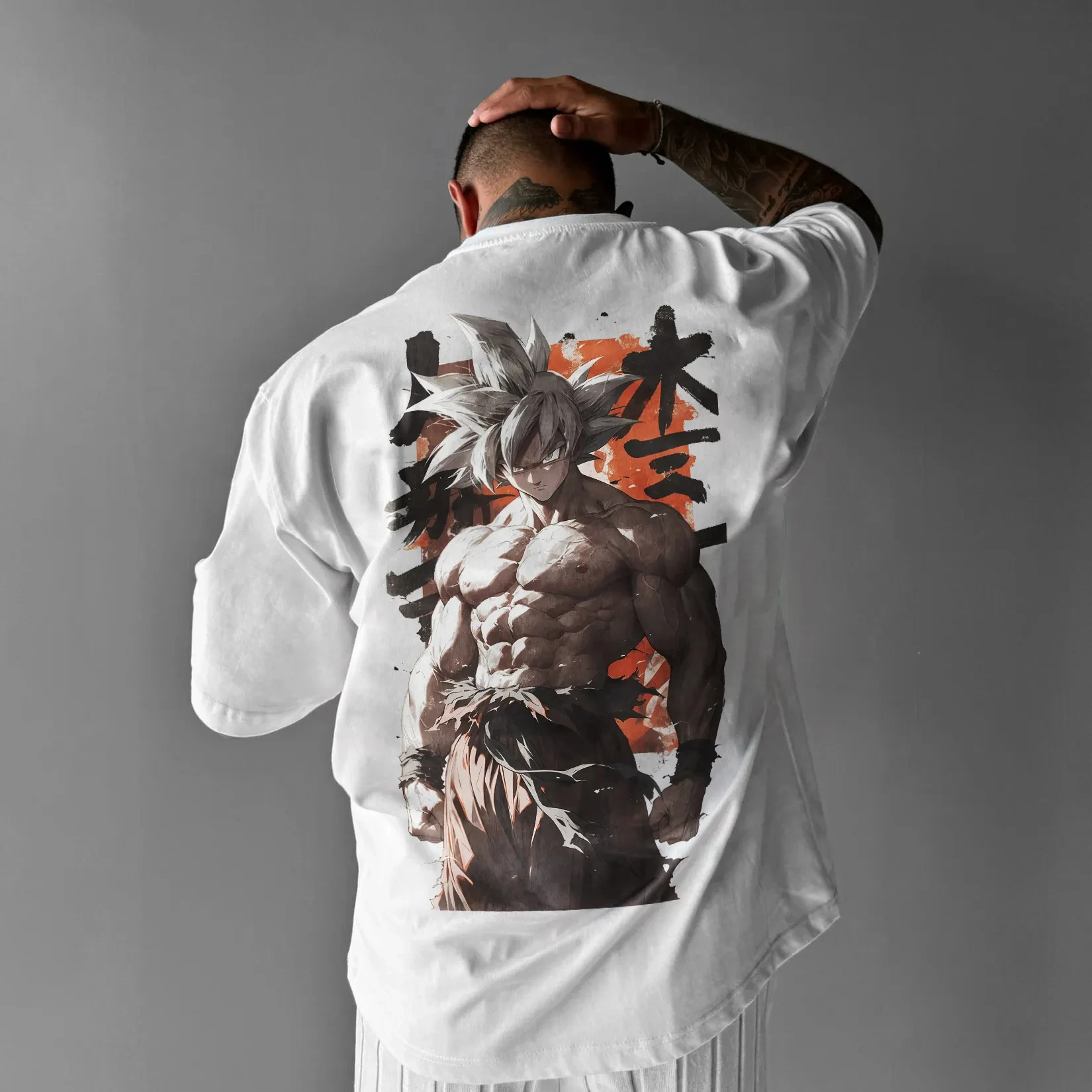 T-shirt girocollo larghe sportive traspiranti estive da uomo e da donna americane a maniche corte in cotone stampato Dragon Ball Goku