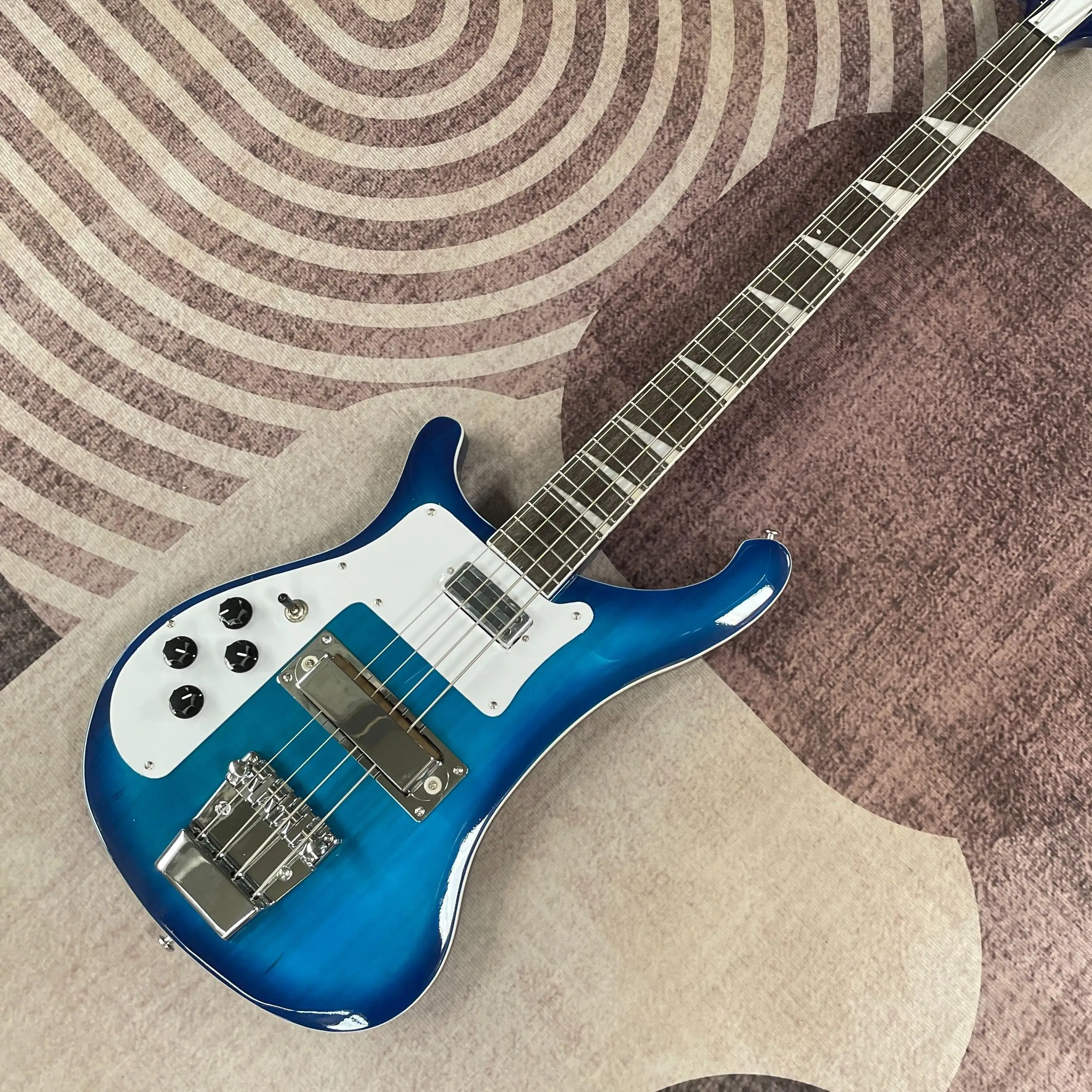 Left Handed 4 String Bass Guitar, Blue Burst Flame Maple Top, Dual Closed Pickups, Chrome Bridge, Block Inlays, White Guard