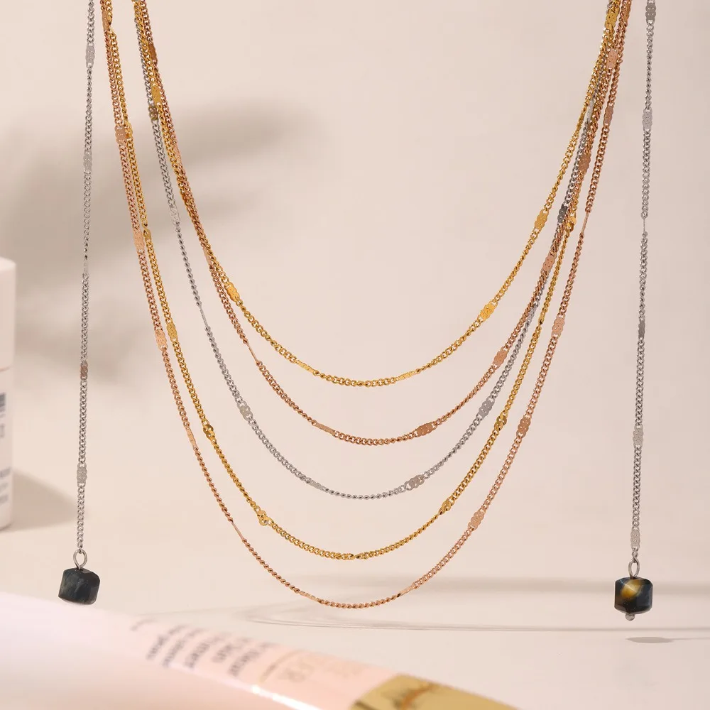 

Women's Necklace with Hammer Pattern 8-shaped Side Chain Cut Volcanic Stone Pendant Tassel Stainless Steel Jewelry
