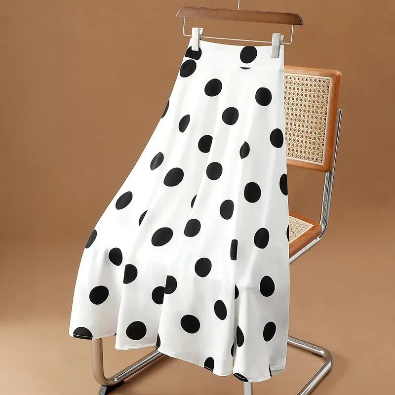 Tempérament grande jupe à pois femmes 2025 été nouvelle taille haute en mousseline de soie parapluie jupe mi-longue grand ourlet longue