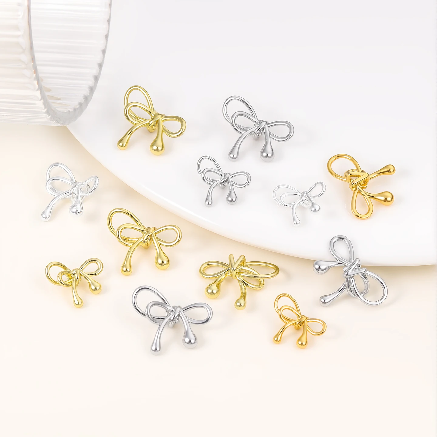 

2pcs/Lots 14/18K Gold Plated Brass Bow shape beads Spacer Beads for Handmade DIY Necklaces Earrings Jewelry Making Findings