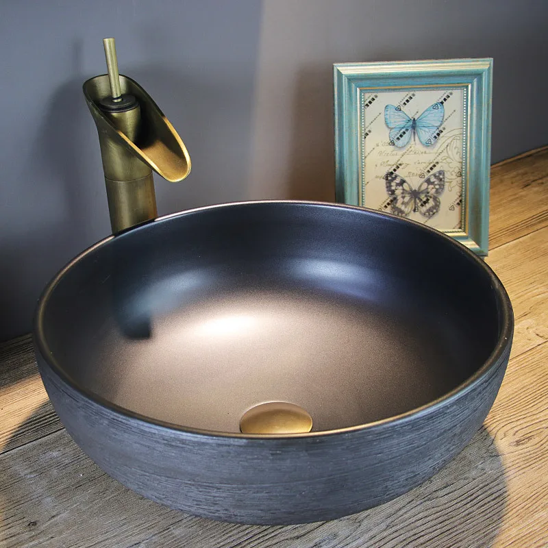 lavabo-de-table-circulaire-en-ceramique-simple-lumiere-de-luxe-art-creatif-lavage-inter-plateforme-lavabo-de-menage