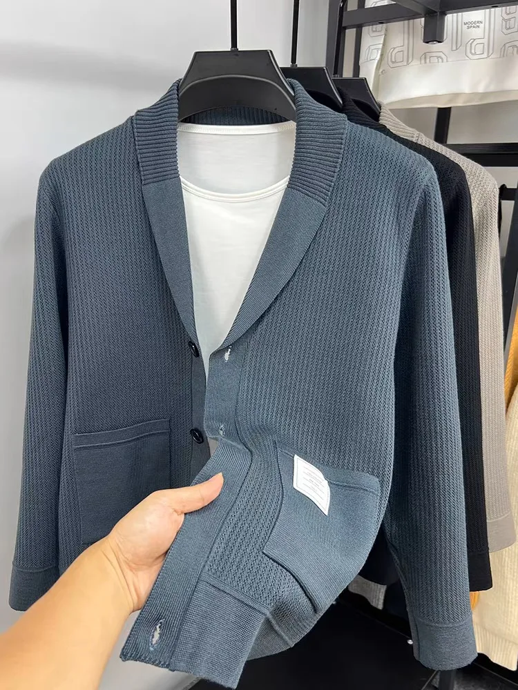 

high-end men's knitted cardigan autumn winter fashionable light luxury pocket jacquard Korean style design casual sweater coat