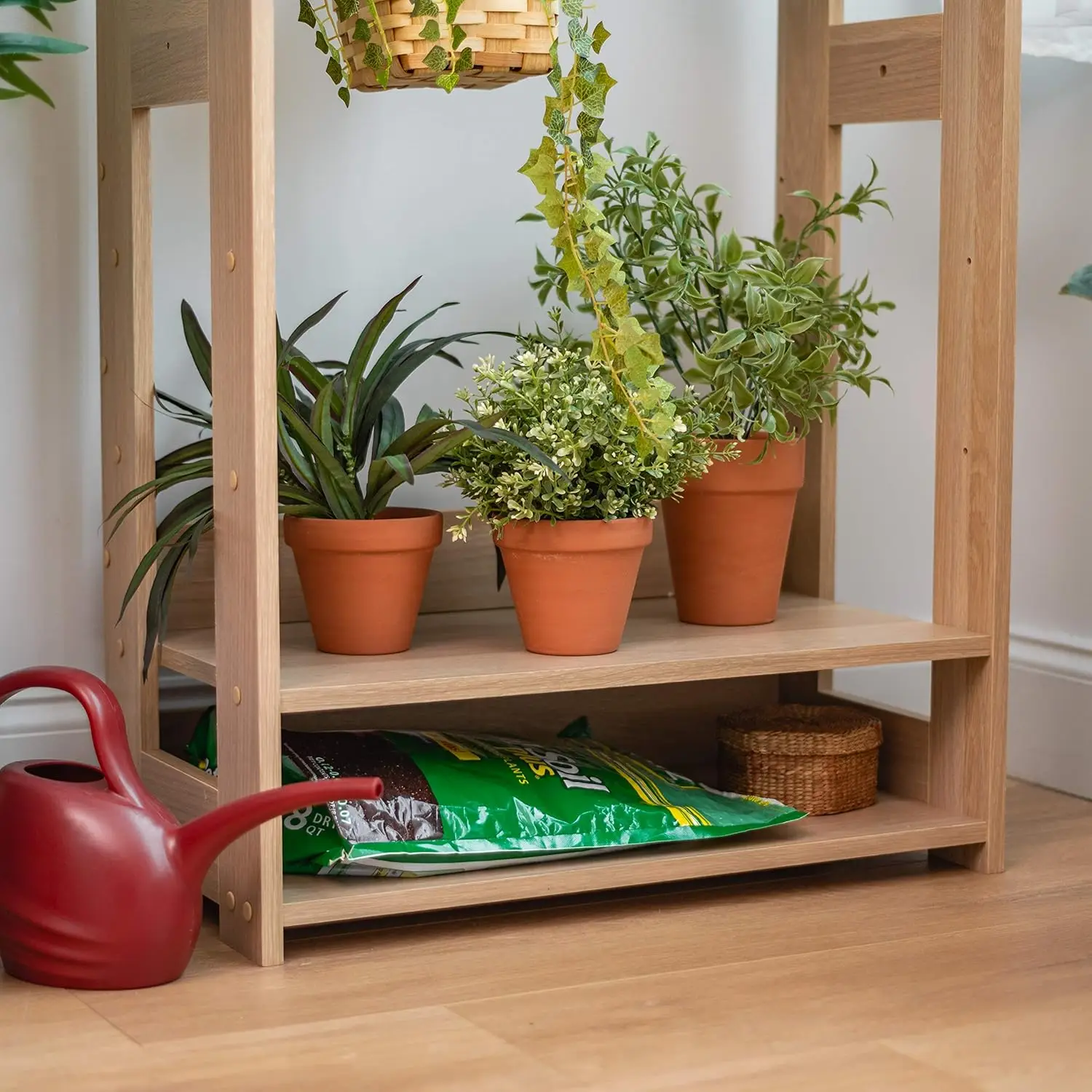 Compact Wooden Clothing Rack with Adjustable Shelves and Hooks for Small Spaces, Light Brown