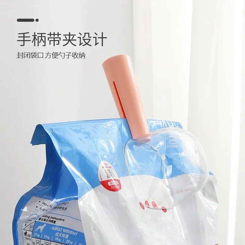 مستلزمات ملعقة شفافة جديدة لأغذية الحيوانات الأليفة مع قياس متدرج لتغذية القطط والكلاب وملعقة مجرفة منتجات الحيوانات الأليفة