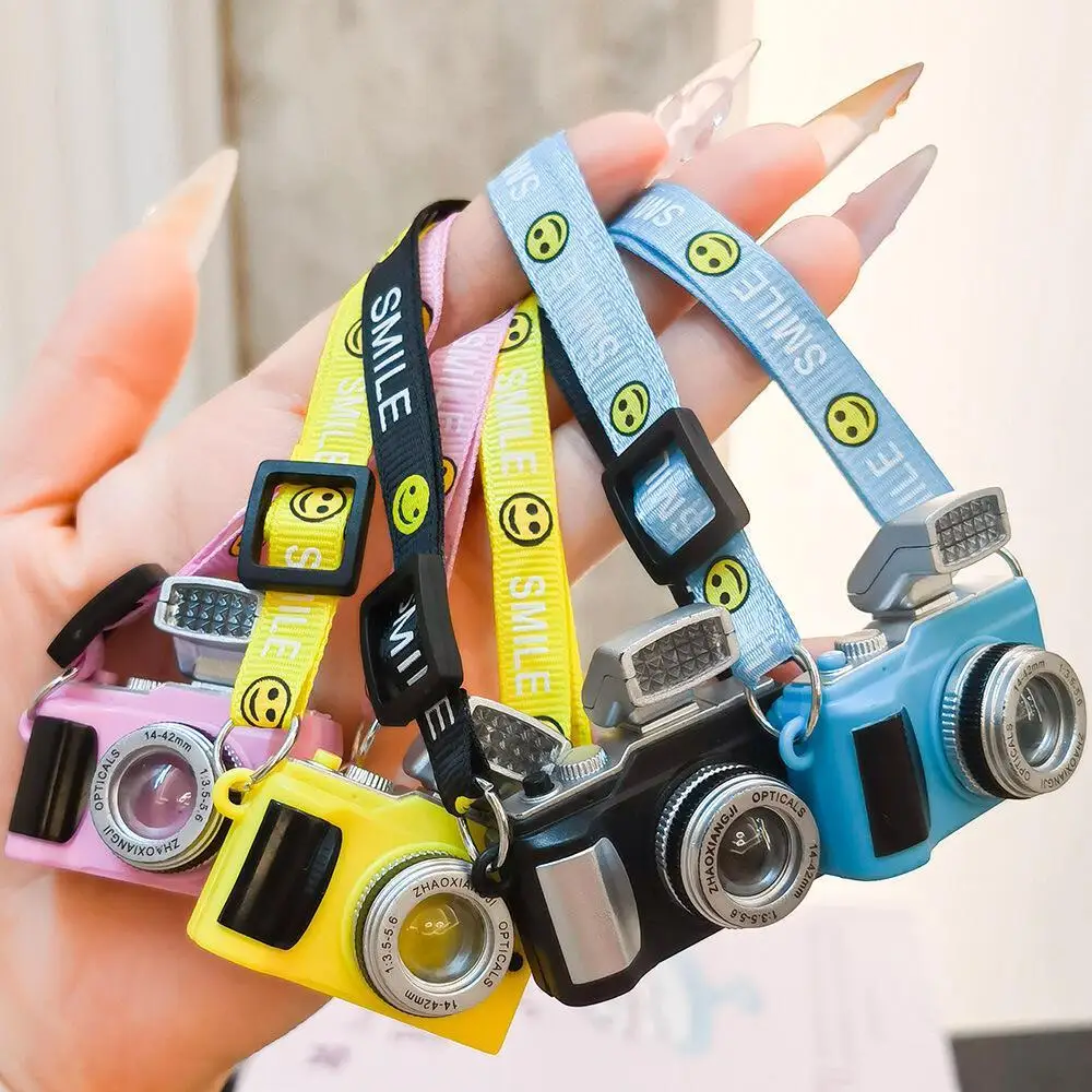 Mini caméra porte-clés avec lumière et son, joli accessoire pour sac à main