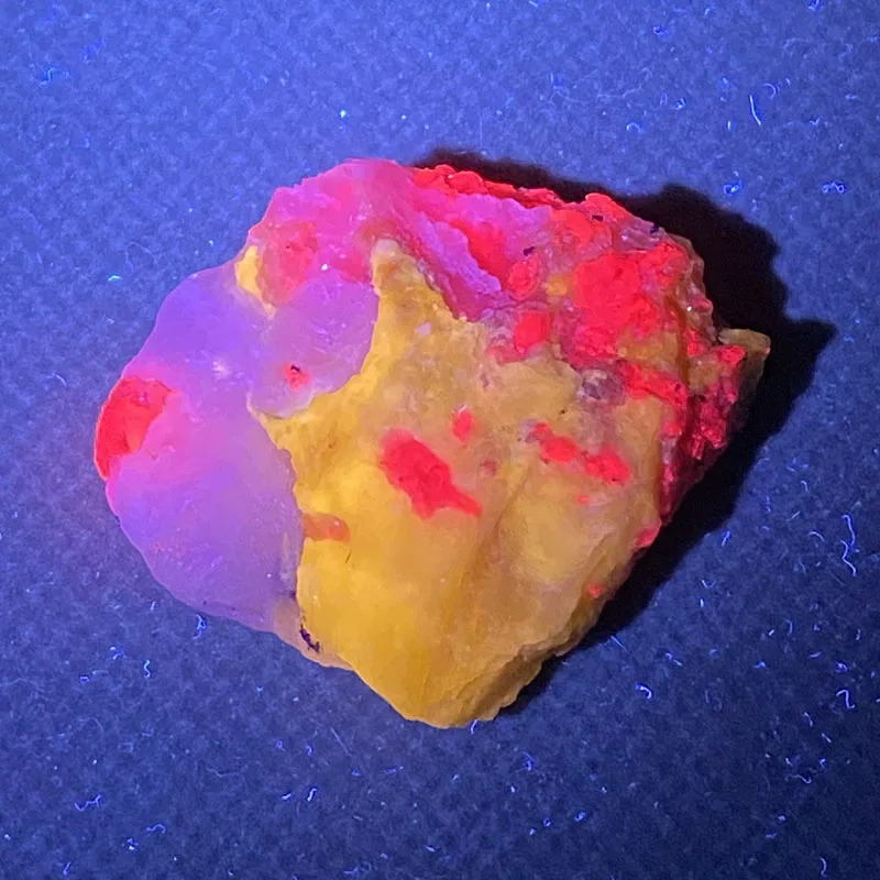 

100% natural sodalite and ruby (fluorescence effect yellow and red rough mineral specimens cure crystal