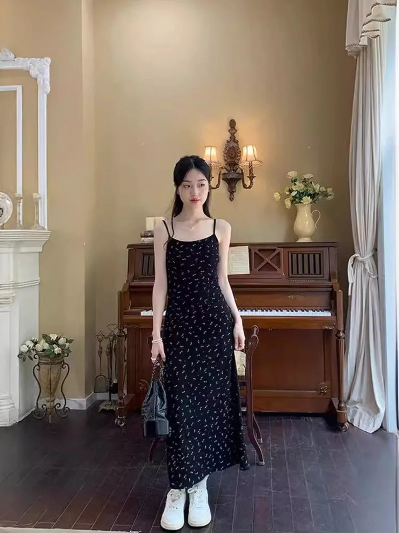 

French black floral camisole seaside vacation revealing body shape buttocks wrapped skirt high-end and elegant long dress WRGY