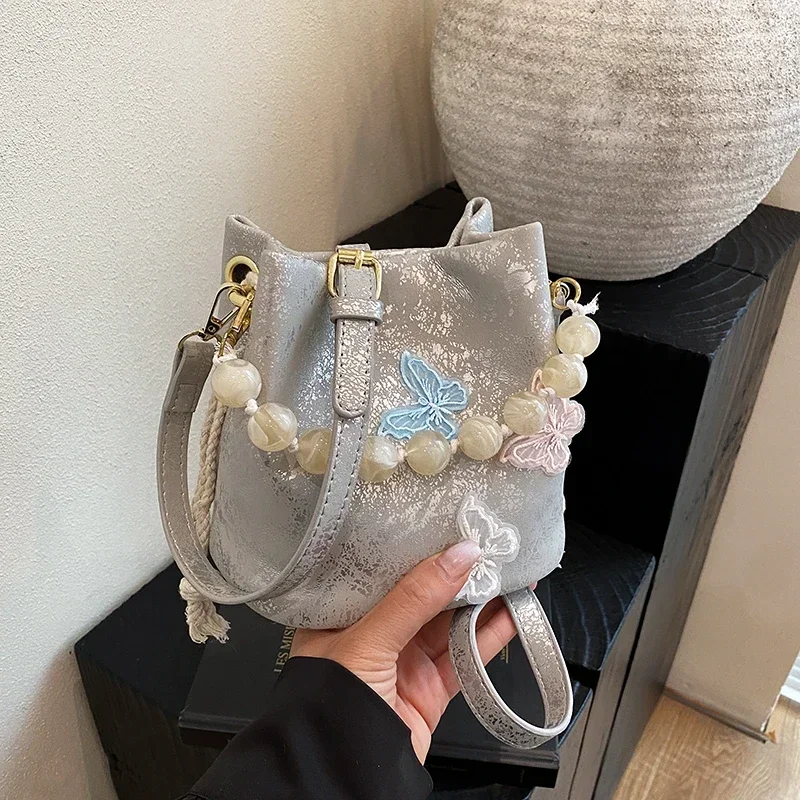 

Fashion Beading Bow Hasp Crossbody Bags PU Sewing Thread 2025 New Casual Commuting Versatile Solid Color Shoulder Bags
